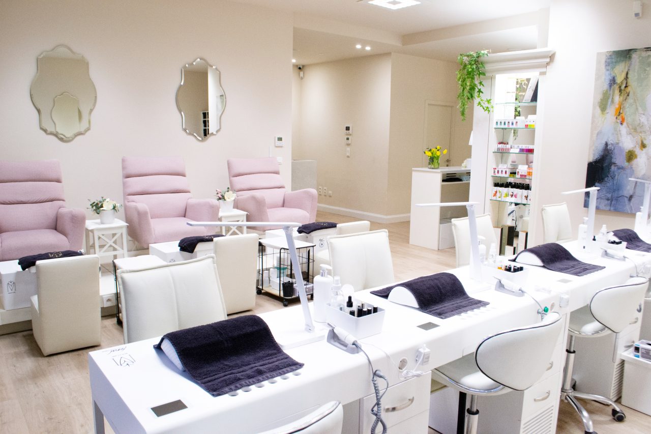 Professional Nail Salon Brussels interior with luxury manicure stations and elegant decor